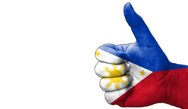 thumbs up in approval with the Philippin flag painted, photo