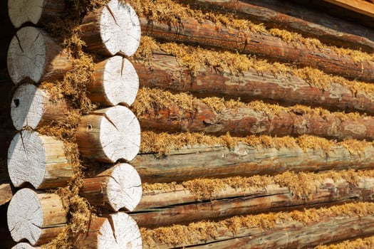 Detail of a log house, Wooden log wall. Corner of a log house photo