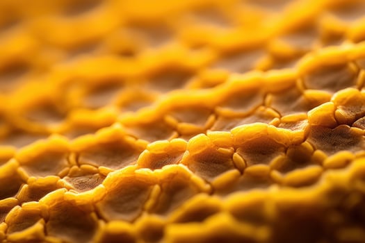 Close up of golden honeycomb texture photo