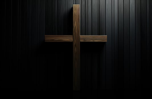 Wooden cross on dark background photo