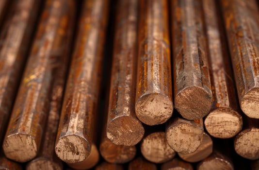 Pile of rusty metal rods photo