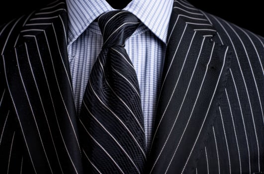 close up of a mans suit and tie photo