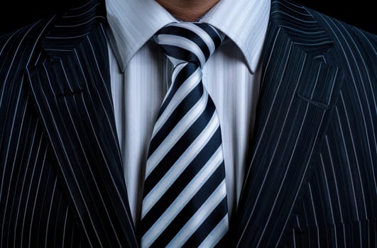 close up of a businessmans suit and tie photo