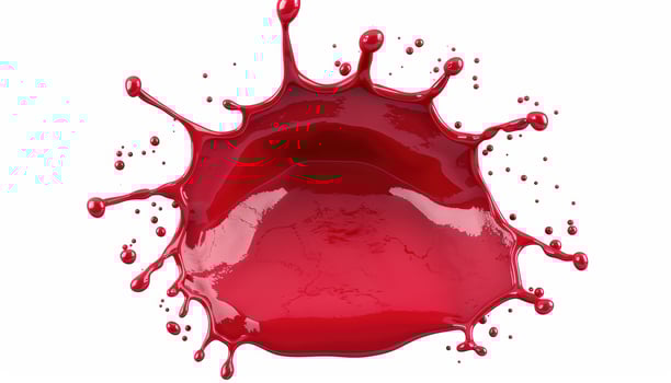 Vibrant red paint splash photo