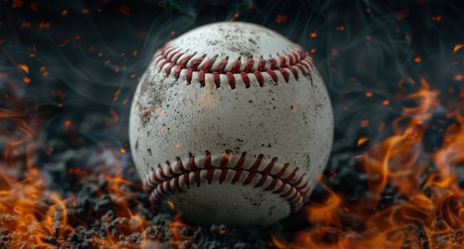 Burning baseball in dark environment photo