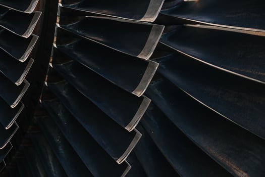Turbine Blades, High Precision Engineering. Large Fan Stack Layer Metal Part Rotor In Jet Engine Or Steam Power Plant. photo