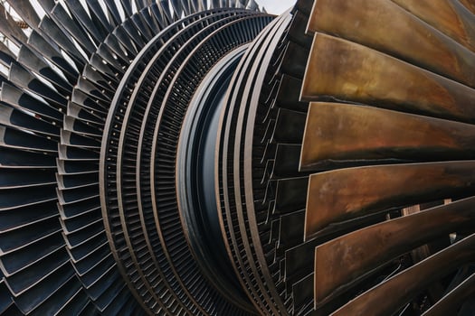 Turbine Blades, High Precision Engineering. Large Fan Stack Layer Metal Part Rotor In Jet Engine Or Steam Power Plant. photo