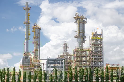 Fuel oil and gas petroleum building with distillation columns, Crude oil refinery process plant large construction complex building in petrochemical industrial. photo
