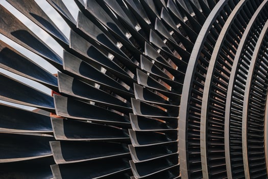 Turbine Blades, High Precision Engineering. Large Fan Stack Layer Metal Part Rotor In Jet Engine Or Steam Power Plant. photo
