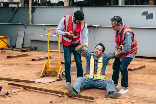 Accident worker injury, man down at construction site, construction worker need medical emergency. photo