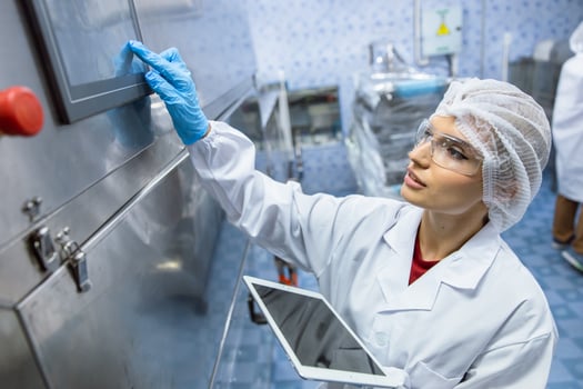Hygiene women worker work in science laboratory. people in pharmaceutical medicine production machine inspector. photo