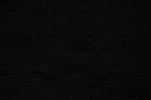 Black stucco texture. Architectural abstract background. Dark wall of building. photo