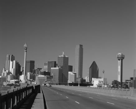 Modern Urban Skyline with Skyscrapers and Clear Blue Sky by Daylight photo