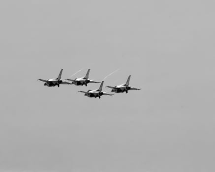 Military jets airshow background, modern military fighters in the sky photo