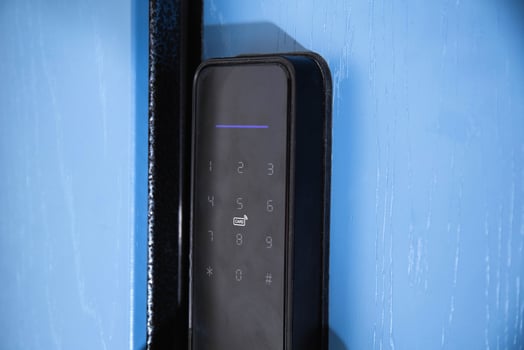 Modern electronic reliable door lock using an access password and a card. High burglary protection. photo