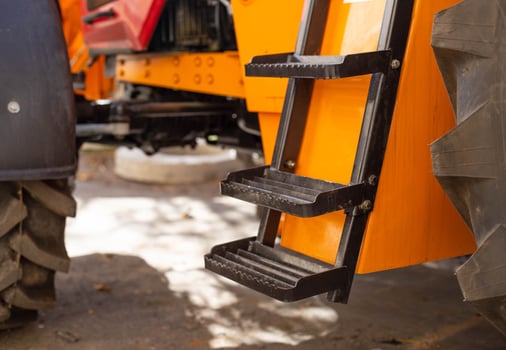 Footrest for comfortable tractor access, industry photo
