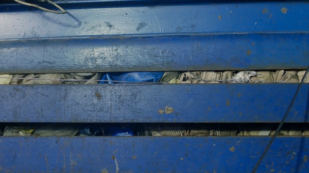 Press for pressing garbage at a waste recycling plant, close-up, environmental photo