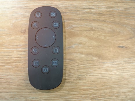 Close up of remote control presentation projector photo