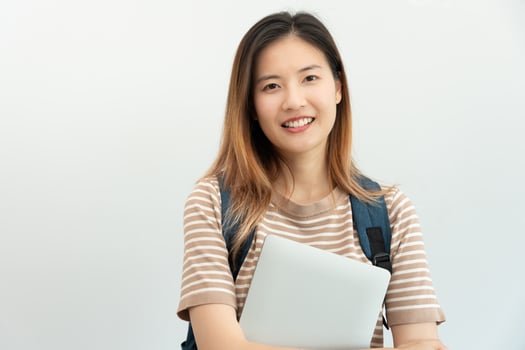 Portrait beautiful Asian woman student. Smile girl happy study. read book in college campus. young female on international Asia University. Education, study, school, learning, exam, continue education photo