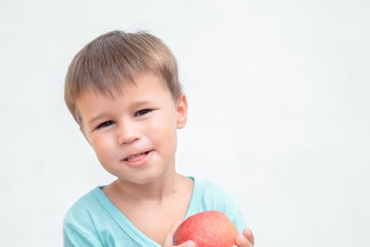 Child with apple photo