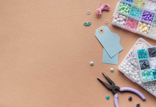 Creating personalized crafts with beads and tags on a light background for various DIY projects photo