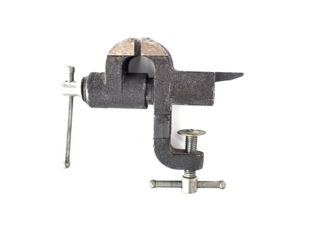 Small black desktop vise, close-up, isolate, scavenger's daughter photo