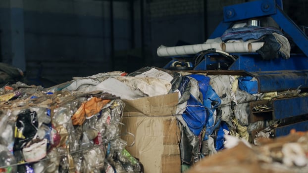 Recycling plant, pressing garbage on special equipment in bales, processing, recycled photo
