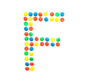 Multicolored alphabet from children's mosaic letter F photo