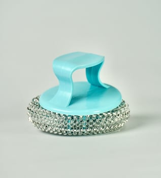 Round metal steel rough scrubber sponge object tool with blue handle isolated on vertical plain background. photo