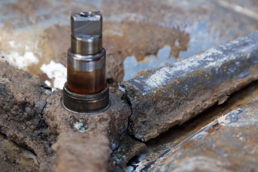 Broken crosspiece in the washing machine drum. Repair and replacement of the cross, industry, close-up photo