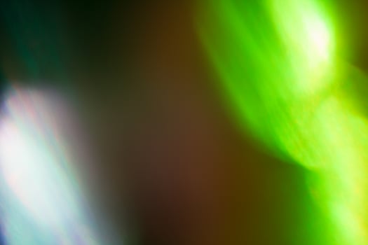 illuminated burst of multicolor light. lens flare shine effects. creative background, abstract photo