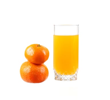 An orange and a glass of orange juice photo