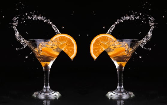 Vermouth cocktail inside martini glass over dark background photo
