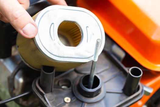 replacement of the air filter in the motoblock, service maintenance of agricultural machinery.Industry, walk-behind tractor photo