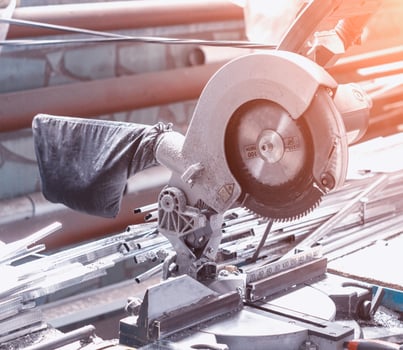 production of pvc windows, circular saw for cutting metal profiles, cutting photo