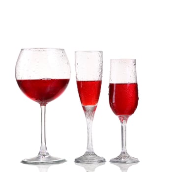 Set of glasses with red wine photo