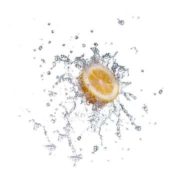 segment of lemon falling in to the water and making splash photo