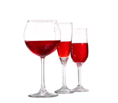 Set of glasses with red wine photo
