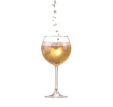 poured white wine on a white background photo