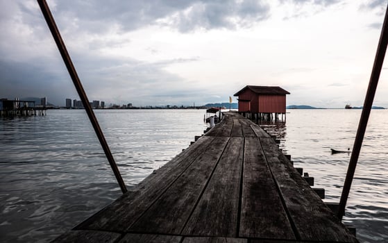 Village on water piles penang malaysia traditional asian houses photo
