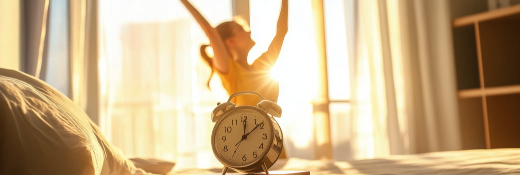 Morning routine of a woman joyfully waking up to the sunlight and a clock on her bedside table photo