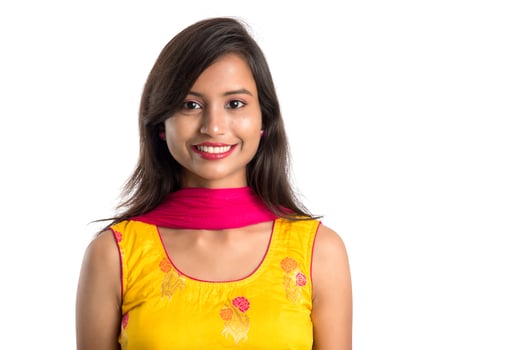 Portrait of beautiful young smiling girl on a white background. photo
