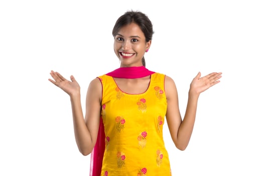 Beautiful Indian traditional girl posing on white background. photo