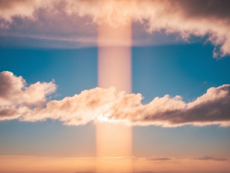 Radiant Golden Sunset with Beaming Sunlight and Puffy Clouds in the Sky. photo