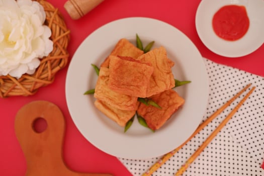Tahu Bakso, Indonesian traditional snack made from tofu and beef. Served in white plate. photo