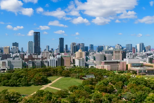 Landscape of building with blue sky from osaka castle viewpoint. osaka city JAPAN photo