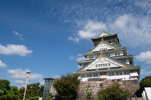 Osaka castle with blue sky background at Osaka city, Japan photo