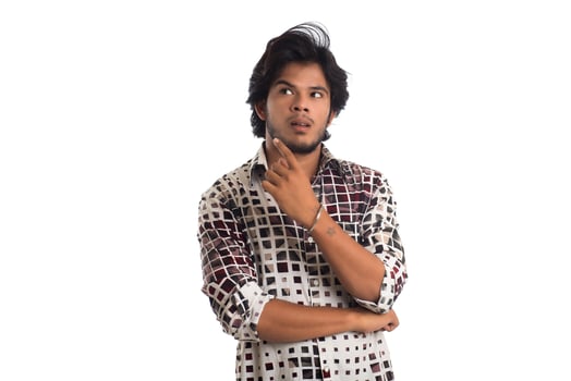 Young man posing on a white background photo