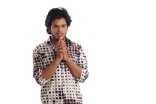 Young man posing on a white background photo