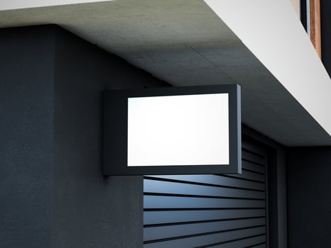 Blank logo sign board on a shop wall photo